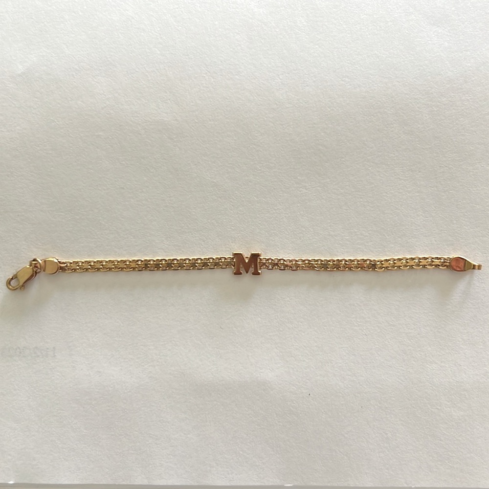 Infant gold monogram M bracelet
